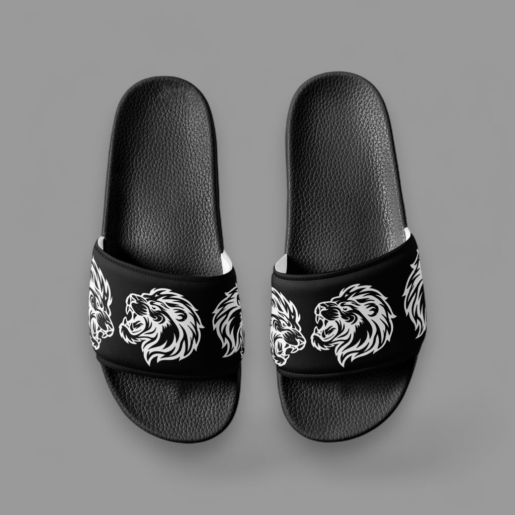 HER SLIP-ONS IN BLACK